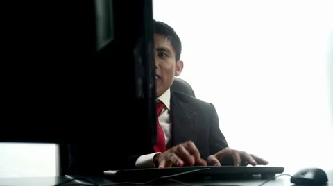 Data Entry Happy: Hispanic Male (4k 16:9 / 23.98) Video stock 2448011