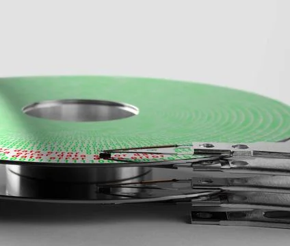 Data error detail shot of a hard disk platter with actuator arm and symbol... Foto stock