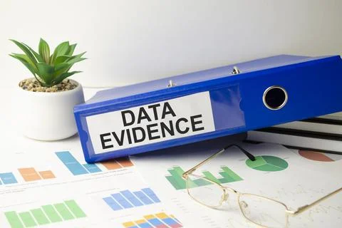 Data evidence words on blue file folder and charts Stock Photos