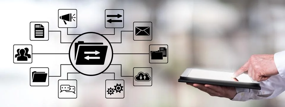 Data exchange concept with man using a tablet Stock Photos
