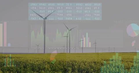 Data feed driving animated charts over horizon wind turbines rotating while Stock Photos