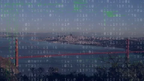 Data feed starting binary digits overlaying red suspension bridge and skyline Stock Footage 333911540