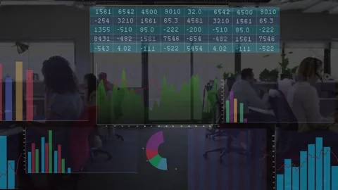 Data feed updating, analysts viewing faint charts shifting, settling over open Stock Footage 333648113
