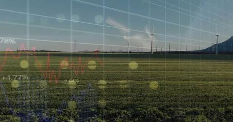 Data interface with faint hand overlaying grid and line graphs in rural field, Stock Photos