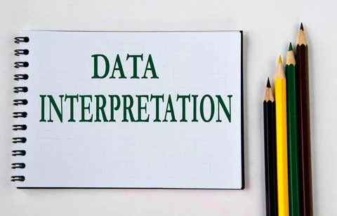 DATA INTERPRETATION - words in white notebook on white background with pencil Stock Photos