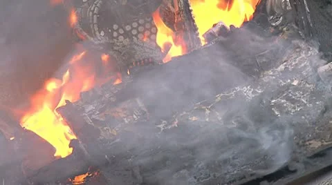 Data Loss Likely - Computer Burning 2 - close Stock Footage