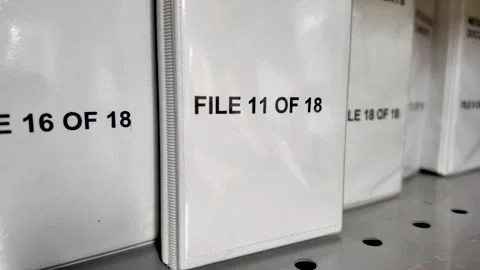 Data Management And Compliance Close Up Of File Folders On Shelf In Office Stock Footage 331028815