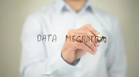 Data Migration, man writing on transparent screen Stock Footage 62771004