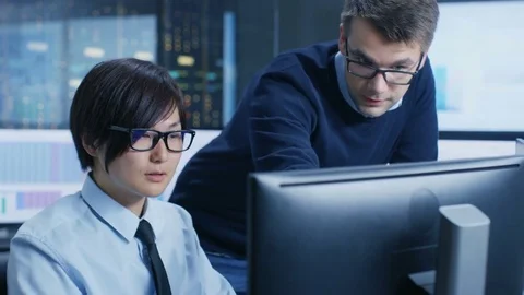 In the Data Mining Center Chief Statistician Consults His Young Assistant Stock Footage 80989945