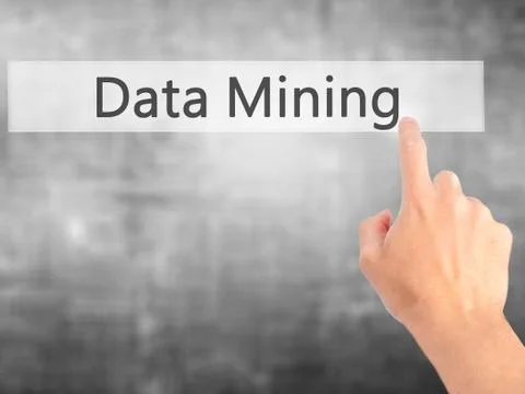 Data Mining - Hand pressing a button on blurred background concept on visual  스톡 사진
