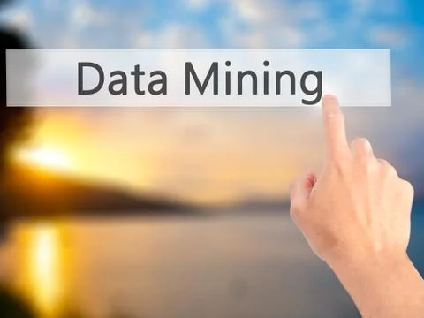 Data Mining - Hand pressing a button on blurred background concept on visual  스톡 사진