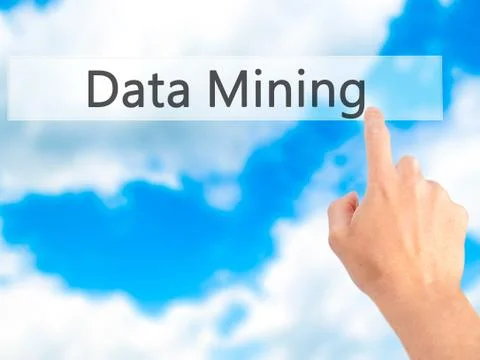 Data Mining - Hand pressing a button on blurred background concept on visual  스톡 사진