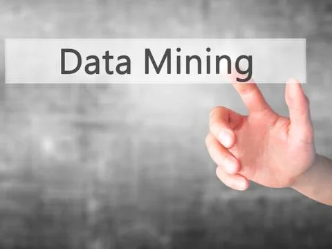 Data Mining - Hand pressing a button on blurred background concept on visual  스톡 사진
