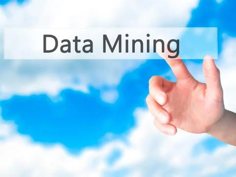 Data Mining - Hand pressing a button on blurred background concept on visual  Stock Photos