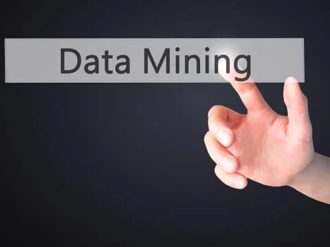 Data Mining - Hand pressing a button on blurred background concept on visual  Stock Photos