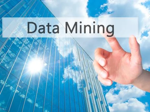 Data Mining - Hand pressing a button on blurred background concept on visual  스톡 사진