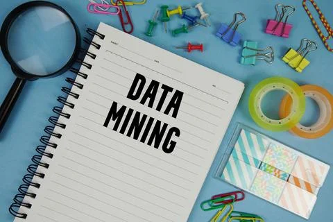 Data Mining text with magnifying glass on blue background Stock Photos