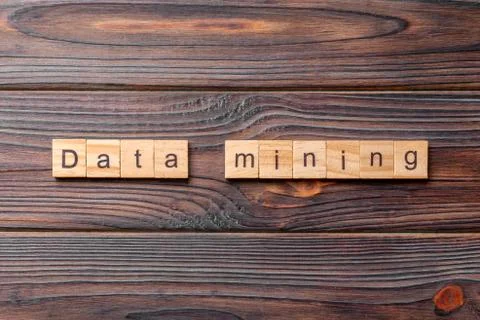 Data mining word written on wood block. Data mining text on cement table for  Stock Photos