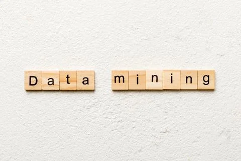 Data mining word written on wood block. Data mining text on cement table for  Foto stock