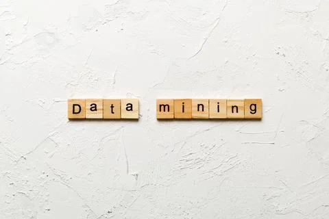 Data mining word written on wood block. Data mining text on cement table fo.. Foto stock