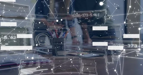 Data overlay animating over meeting table, two women leaning, pointing, sorting Stock Footage 328469685