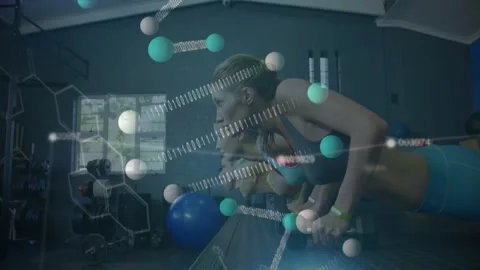 Data overlay shifting panning and zooming to woman doing dumbbell pushups 動画素材 323385901