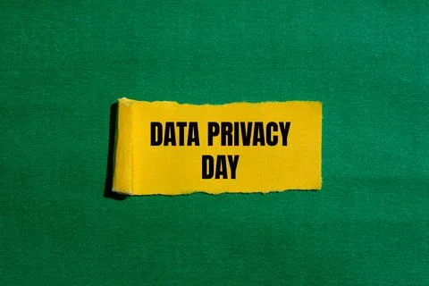 Data privacy day message written on ripped torn yellow paper piece with gre.. Stock Photos
