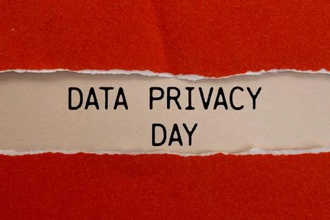 Data privacy day message written on ripped torn red paper with beige backgr.. Stock Photos