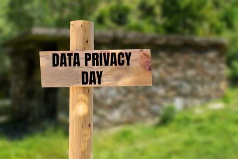 Data privacy day message written on wooden sign with blurry nature backgrou.. Stock Photos