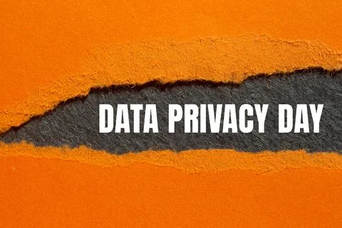 Data privacy day message written on ripped torn orange paper with gray back.. Stock Photos
