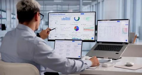 Data Privacy Manager Analyzes Compliance Dashboard To Uphold Security Standar Stock Photos