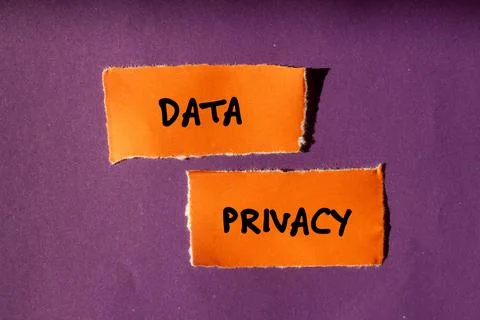 Data privacy words written on ripped paper pieces with purple background Stock Photos