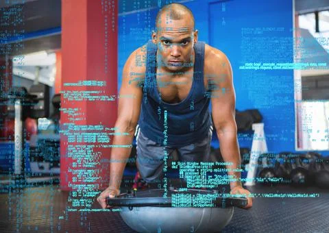 Data processing against african american fit man working out at the gym Foto stock