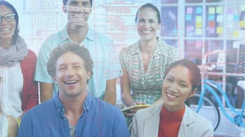 Data processing against diverse office colleagues stacking hands at office Stock Footage 162933157