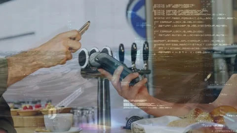 Data processing against mid section of a man making a payment using his Stock Footage 329765824