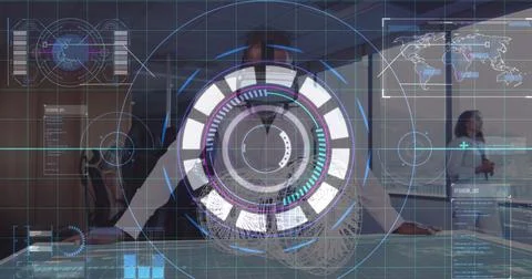 Data processing and neon scope scanner against african american man wearing vr Foto stock