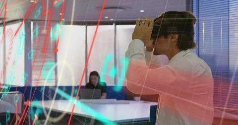 Data processing and scope scanning over caucasian man wearing vr headset at Stock Photos