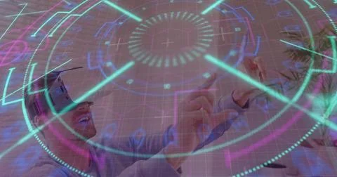 Data processing and scope scanning over caucasian man gesturing while wearing vr Stock Photos