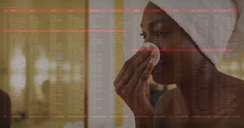 Data processing animation over woman cleansing face with cotton pad Stock Footage 304102561