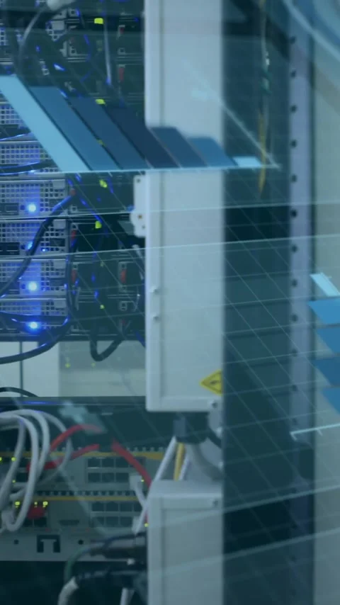 Data processing animation overlaid on server racks and cables in data center Stock Footage 343505196