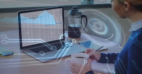 Data processing animation overlay on laptop screen, person working attentively Stock Footage 326425331