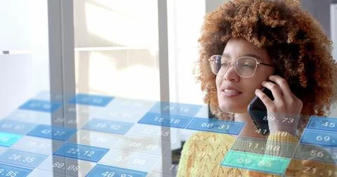 Data processing on interface over biracial casual businesswoman talking on Stock Photos