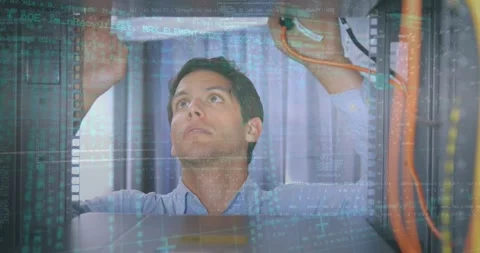 Data processing over caucasian male engineer working at computer server room Stock Footage 326759722