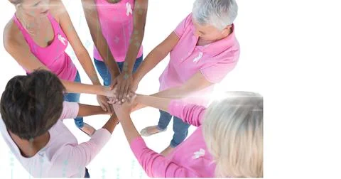 Data processing over group of diverse women stacking their hands together Stock Photos