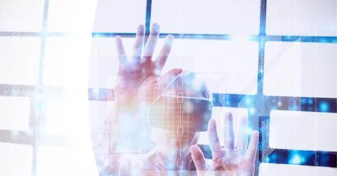 Data processing over man wearing vr headset against white technology concept 写真素材