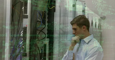 Data processing over portrait of caucasian male engineer smiling at computer Stock Footage 330724437