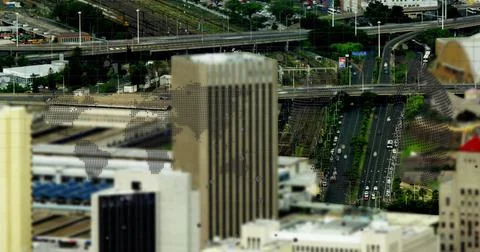 Data processing over world map against aerial view of cityscape in background Stock Photos