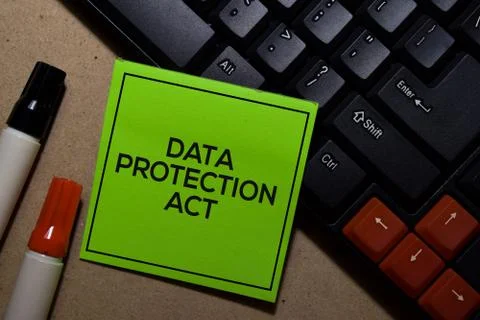 Data Protection Act write on sticky notes isolated on Office Desk Stock Photos