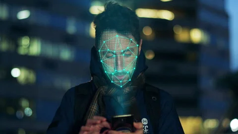 Data protection concept. Man scanning the face by smart phone. Stock Footage 256222506