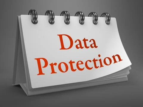 Data Protection -Red Words on Desktop Calendar. Illustrazione stock